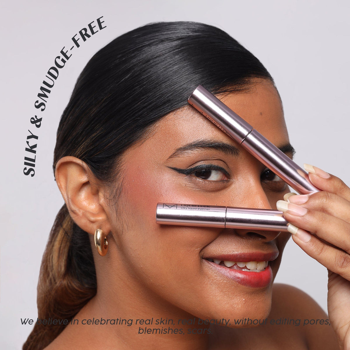 Liquid Luck Silky Eyeliner in Velvet Black by House Of Makeup on the lash line